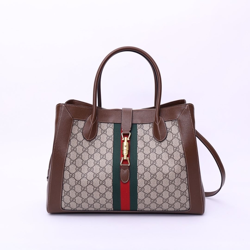 G*u*i top handle bags